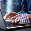 A businessman reviews the steps using a virtual online document